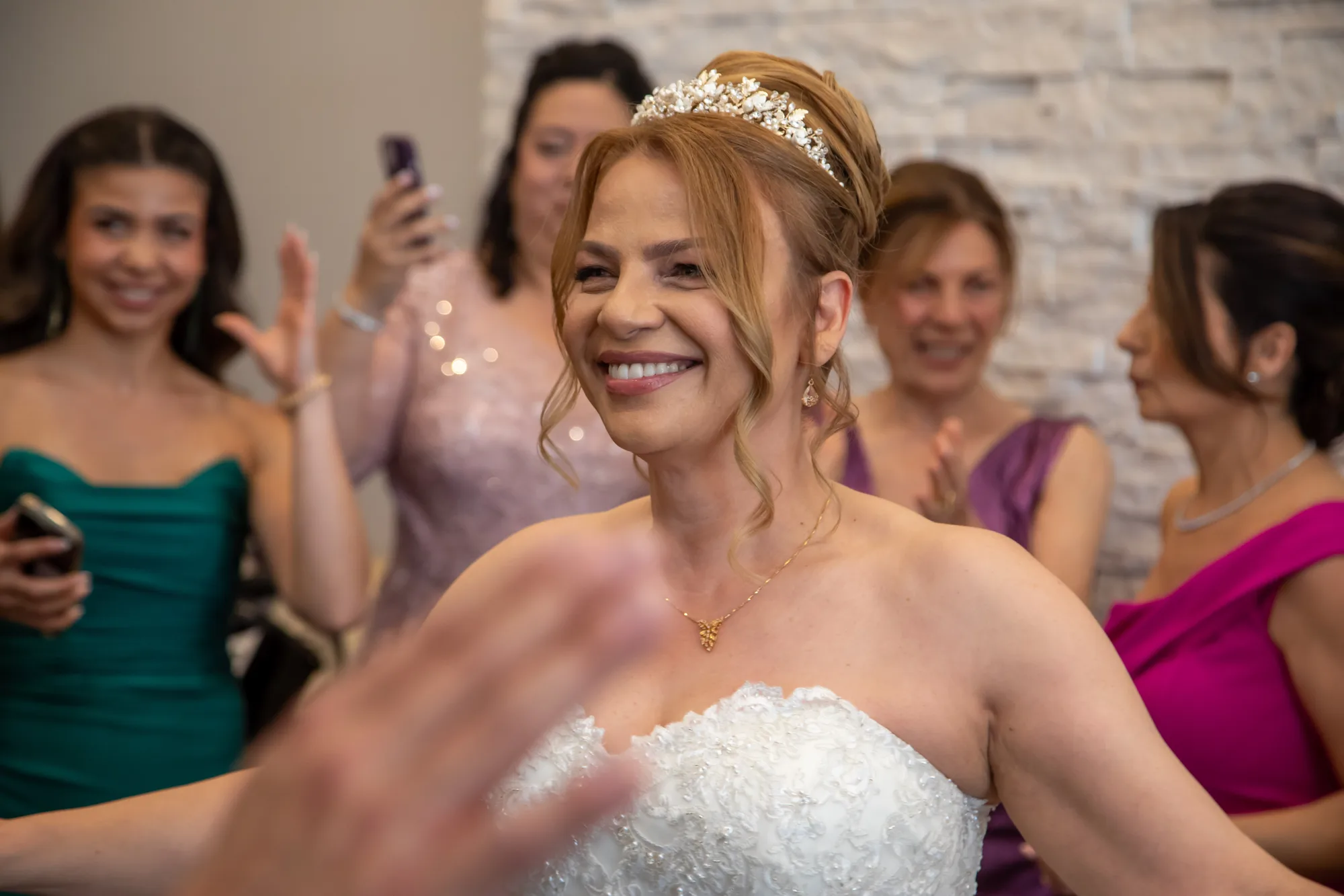Bride greeted by family in the moments before the ceremony