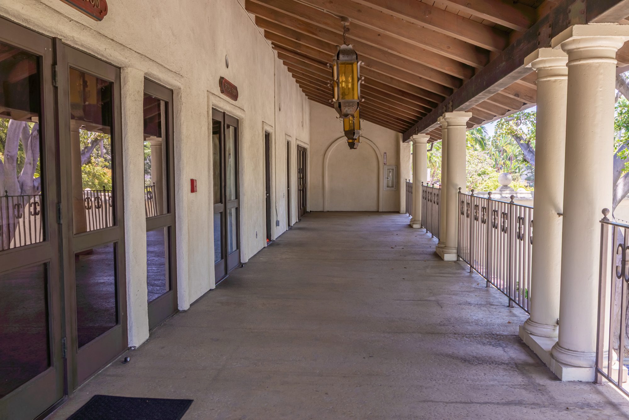 Lanterns down the covered walk at the LA River Center