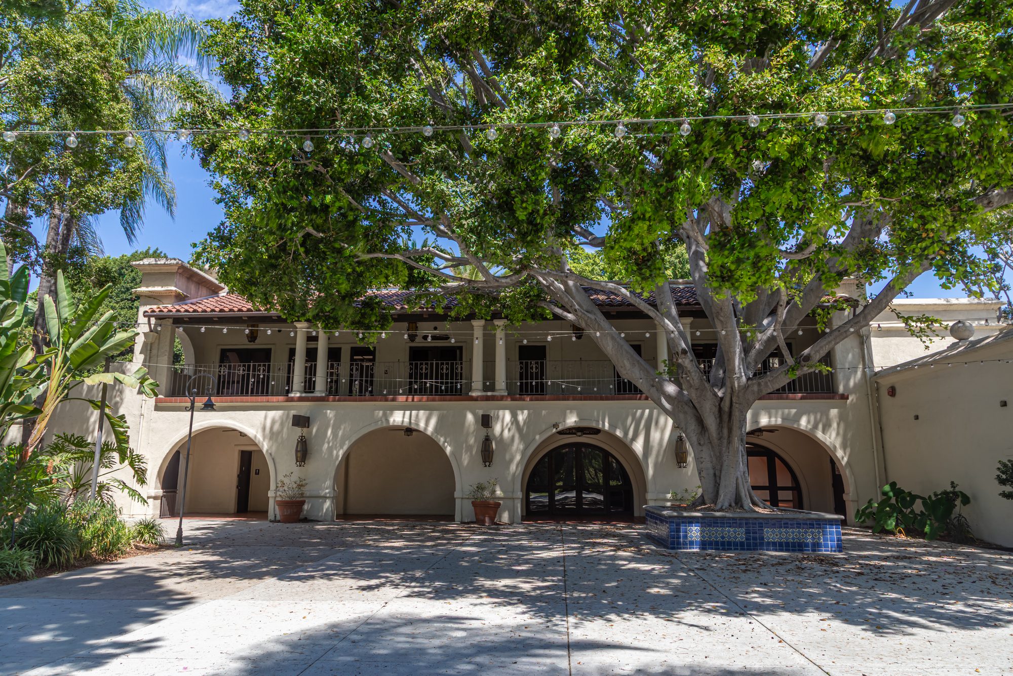The arcaded building seen across the main courtyard at the LA River Center