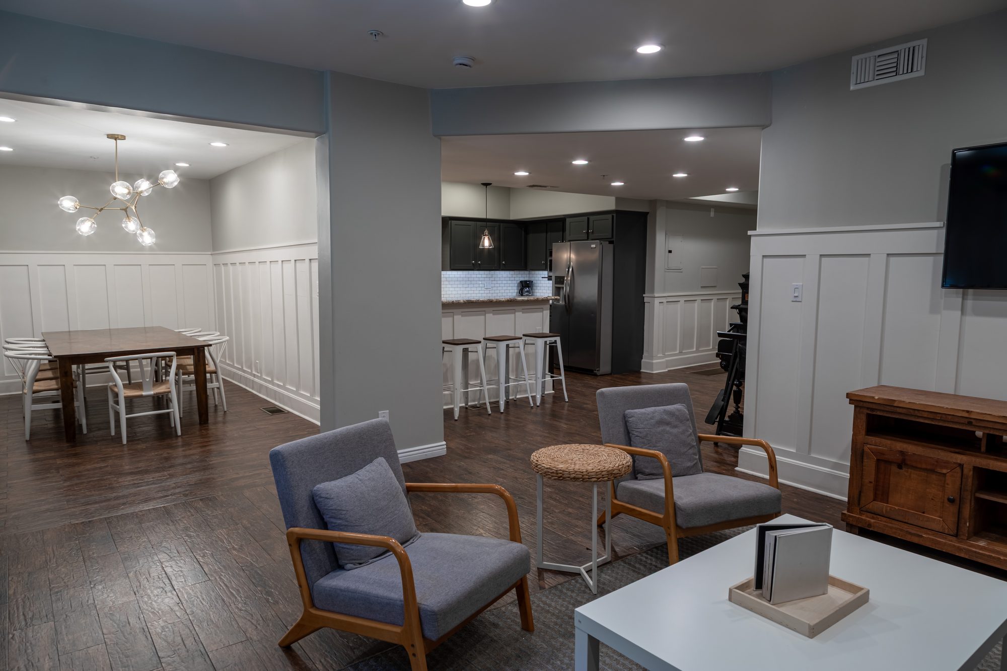 The living room and kitchen at Lombardi House