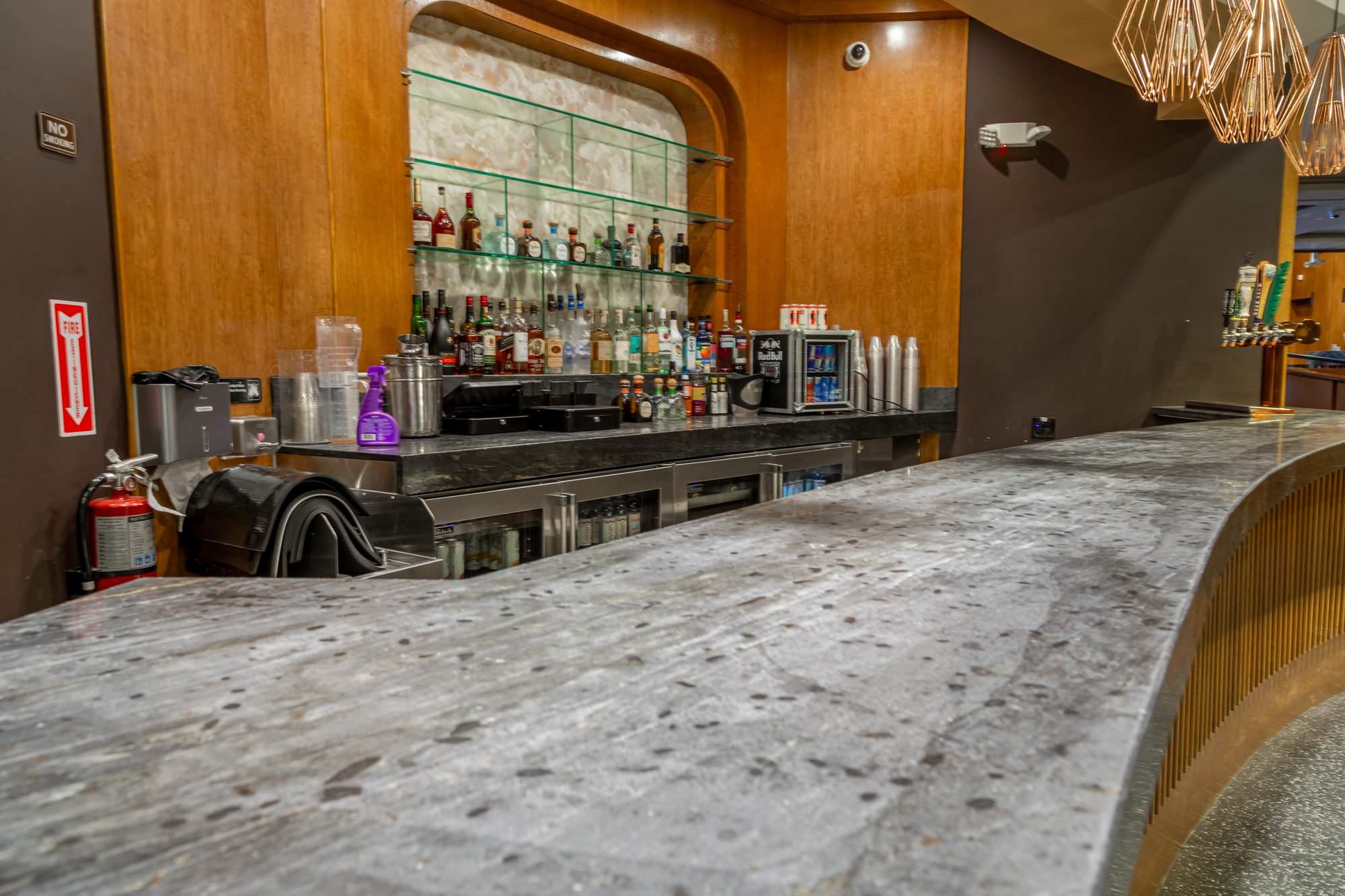 The bar at The Vermont Hollywood with its tiled back wall