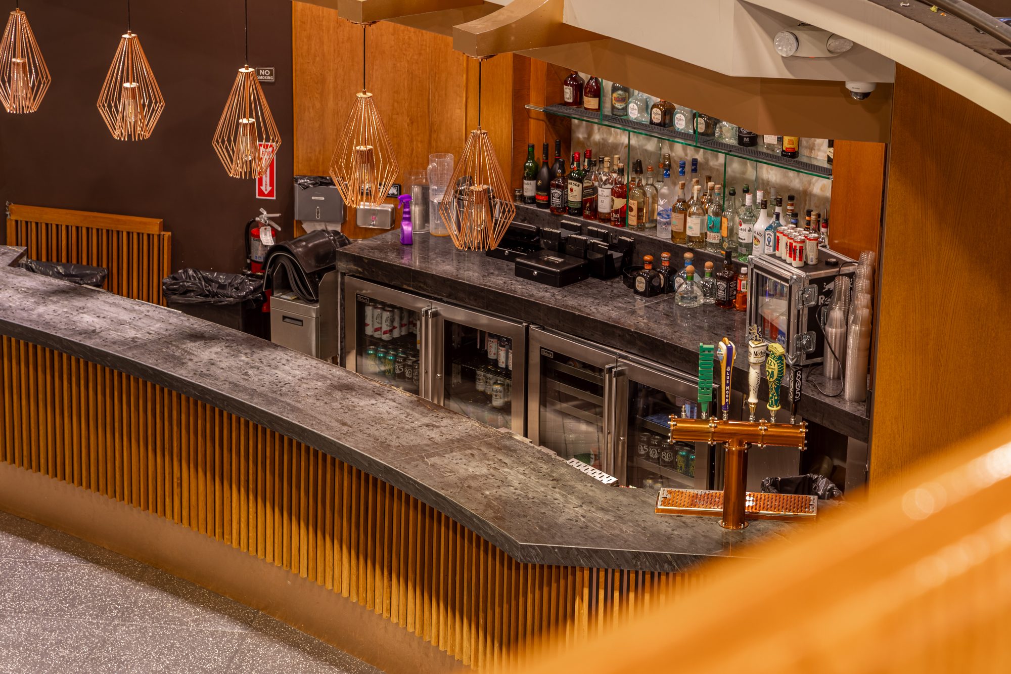 The upstairs bar at The Vermont Hollywood under its pendant lights
