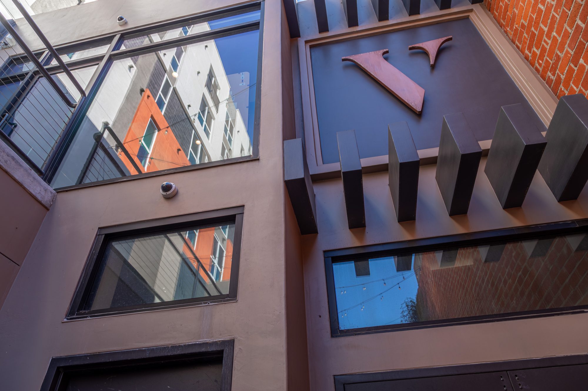 Looking up at the monogram over the entrance at The Vermont Hollywood