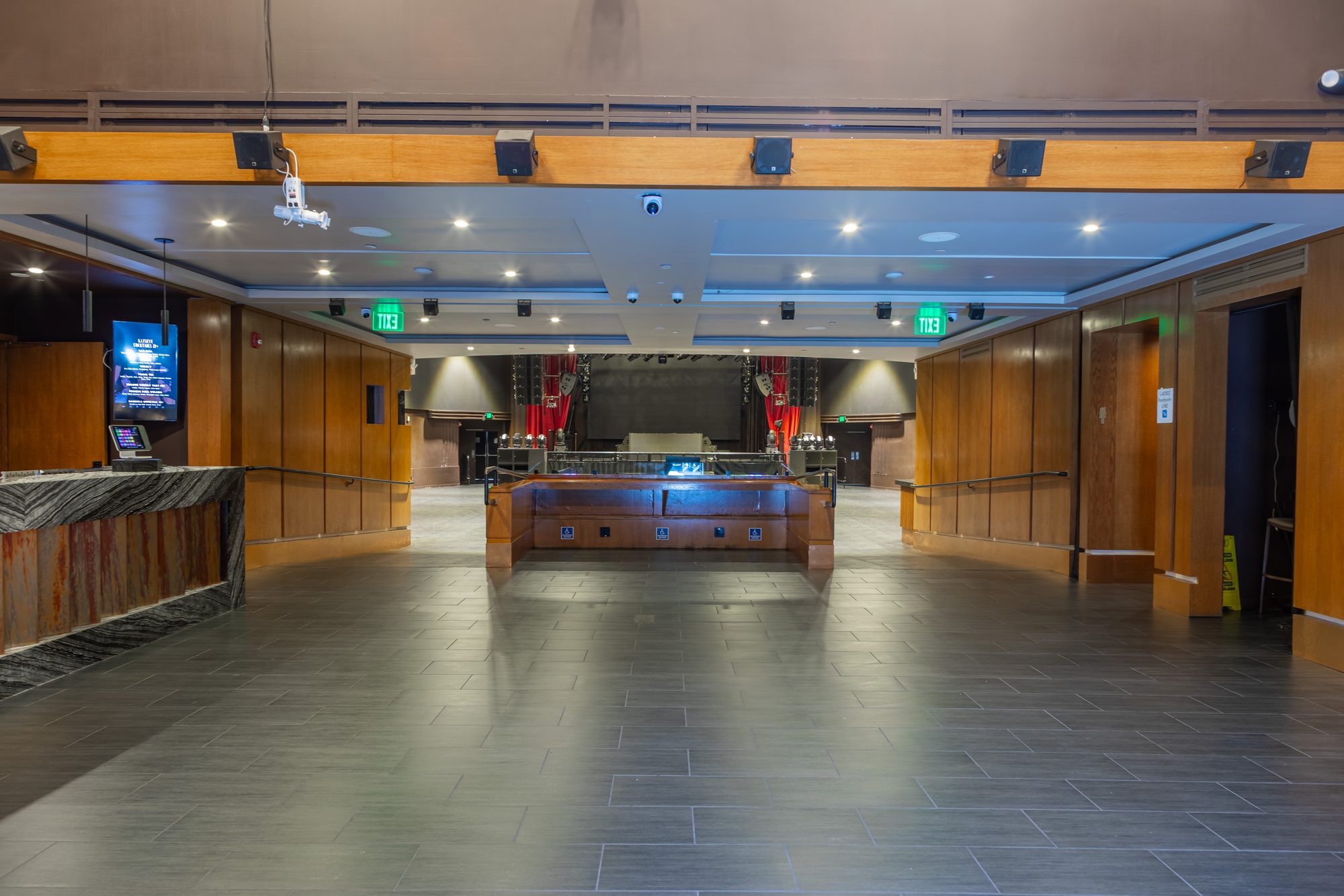The lobby at The Vermont Hollywood, timber walls and the doors through to the floor